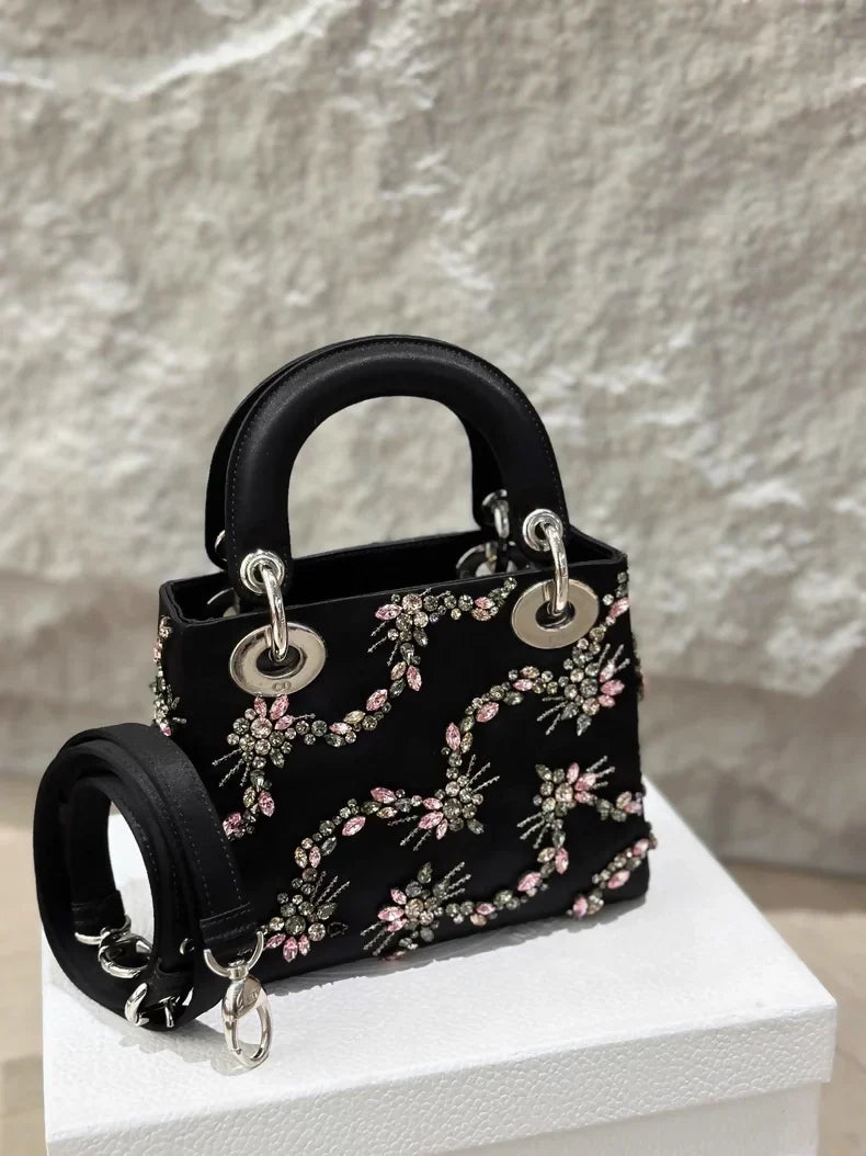 Lady Dior small black silk embroidery bag with silver hardware